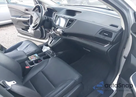 2015 Honda Cr-V Touring z USA, uszkodzony, nr VIN 5J6RM4H95FL109626